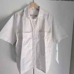 Beautiful light COS minimalist blouse. Perfect for summer. Great condition.